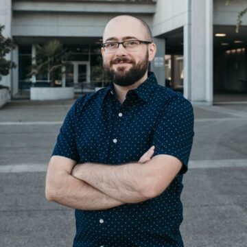 Michael Metiva is the Research Analyst for the Oregon Department of Revenue’s Taxpayer Advocate Office, which works to resolve systemic issues as well as individual taxpayers’ problems. Michael’s work involves a mixture of big-picture analysis and individual case studies. He focuses on using data to tell the story of each problem, justify the need for change, and recommend the best available solutions. Michael began working for the Oregon state government in January 2022. Prior to that, he earned bachelor’s degrees in Physics and Economics before moving on to a master’s degree in Horticulture, all at Michigan State University. Michael Metiva